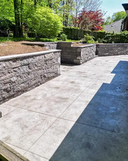 Concrete residential hardscaping with decorative walls
