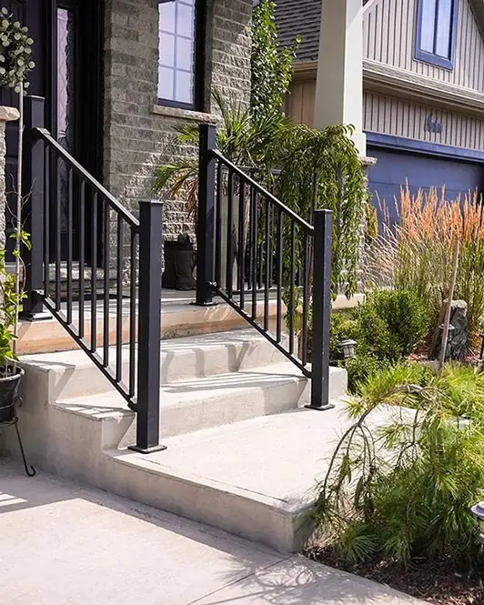 Exterior staircase entryway of a house with a garden